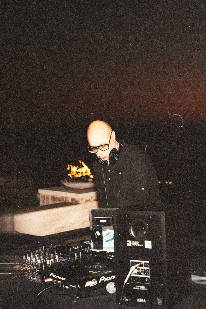 a DJ behind the Deck