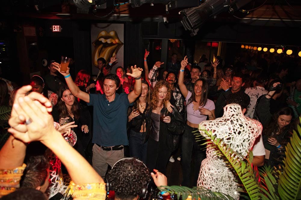 Crowd at a party dancing 