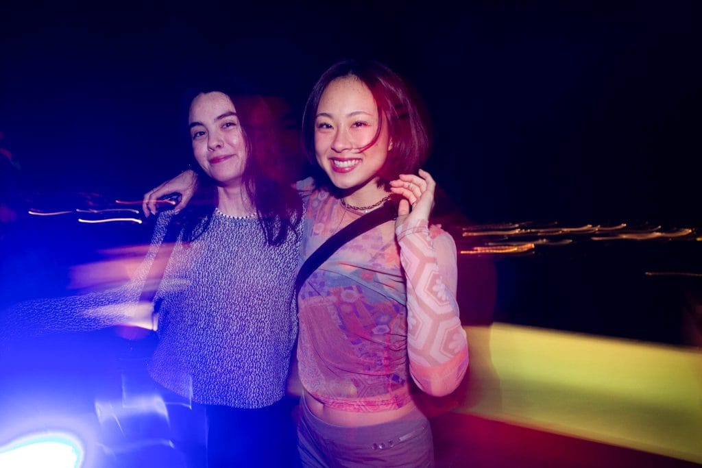 Two women pose for a photo